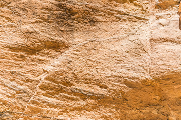 The stone walls of the narrow passage (Siq) that leads to Petra in Jordan