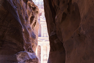 The stone walls of the narrow passage (Siq) that leads to Petra in Jordan