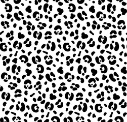 Fototapeta na wymiar Seamless black and white color leopard print. Animal skin pattern. White leopard background. Can be used for fabrics, wallpapers, scrap-booking, etc. Vector illustration.