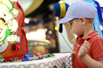 Kid playing in amusement park