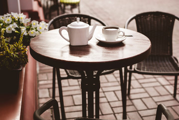 Street view of a empty terrace cafe.