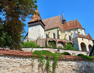 Facade and exterior wall of the fortified church of Biertan in Romania
