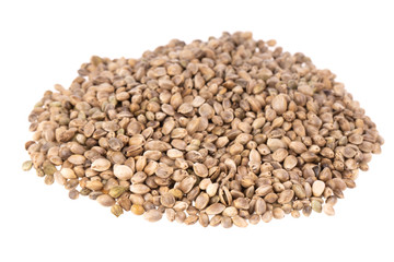 heap of fresh cannabis seeds isolated on white background