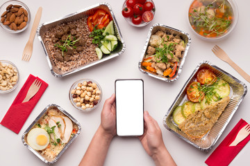 Cellphone with white blank space in woman hands