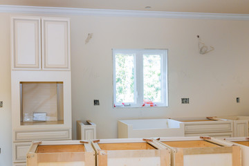White of kitchen wooden cabinets with contemporary look
