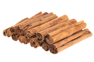 heap of cinnamon isolated on white background