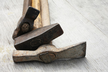 Old rusty hummers on wooden background