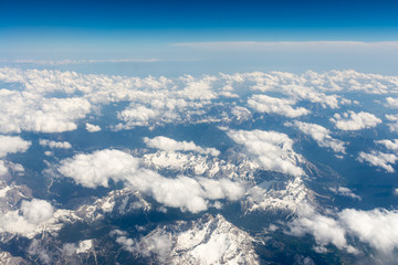 View of the mountain range of the Alps from the airplane