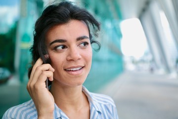 Beautiful business woman outside