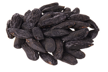 heap of tonka beans isolated on white background