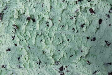 Top view of mint flavour ice cream with chocolate flakes in box