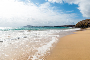 Panorama of beautiful beach and tropical sea of Lanzarote. Canaries