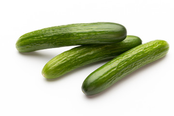 Fresh cucumber on white background.