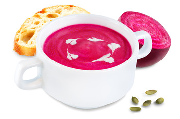 Beetroot soup in white bowl on a white isolated background