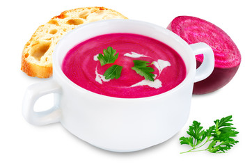 Beetroot soup in white bowl on a white isolated background