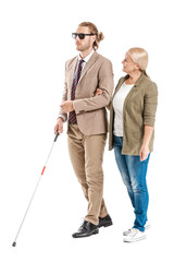 Blind young man with mother on white background
