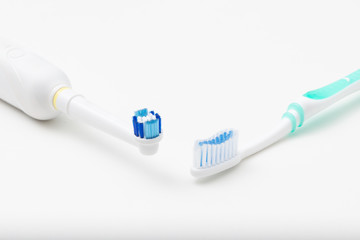 Electric toothbrush versus regular toothbrush