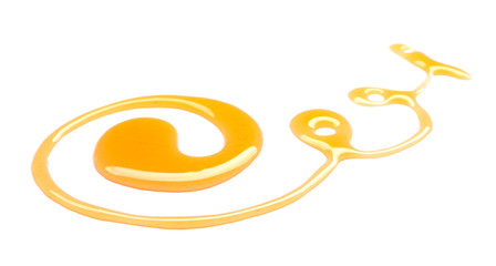 Spilled honey on white background