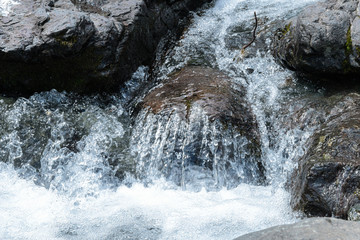 streams of water flowing among rocks