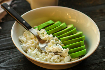 cottage cheese and avocado (wholesome food) healthy nutrition. top food background. copy space