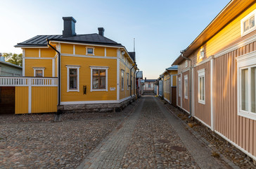 Fototapeta na wymiar Well-preserved houses in the wooden city centre of the town of Rauma, Finland