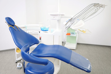 Dentist's office interior with chair and equipment