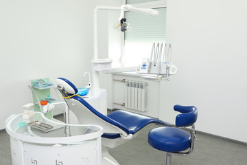 Dentist's office interior with chair and equipment