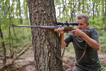 Hunter with rifle