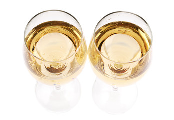 Photo of full transparent wine glasses