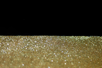 Festive background mit sparkles. Brilliant Christmas and New Years decor. Blurred effect