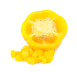 Cut yellow bell pepper isolated on white