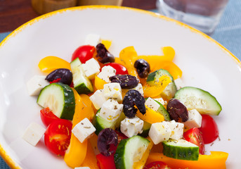 Greek vegetable salad with cheese and olive oil