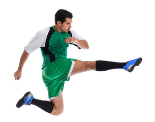 Young man playing football on white background
