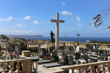 Graves in the cemetery of the Immaculate Conception of Our Lady church (Tal-Hondoq), Qala, Gozo. Malta