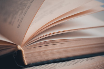 Paged of old open book close up. Education. Selective focus.