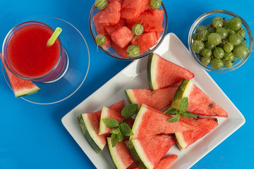 Cold watermelon juice and sliced watermelon