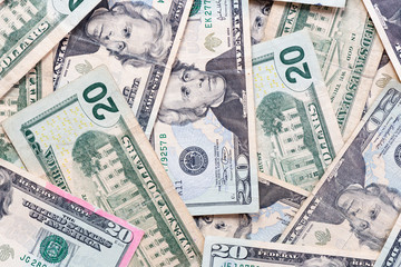 Close up of many twenty dollar bills background