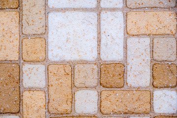 Background Closeup, Top View of Brick Textured Kitchen Floor Linoleum  in White, Brown and Peach...