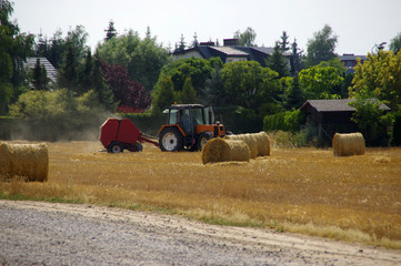 Tractor and sheaf machine working on field
