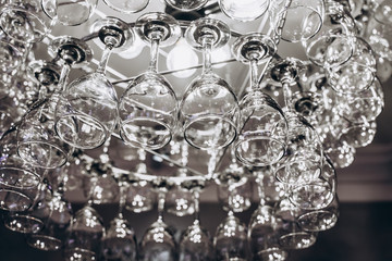 Beautiful chandelier made with glasses of wine