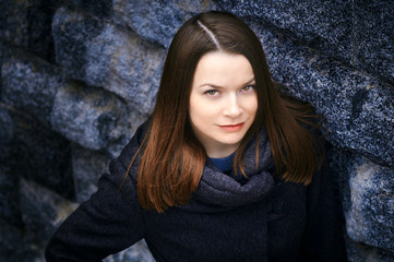 pretty young woman in casual clothes in cityscape