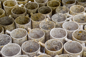 a Mugs of stone, stone products, stone carving.