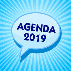 Word writing text Agenda 2019. Business concept for list of activities in order which they are to be taken up Blue speech bubble message reminder rays shadow important intention saying