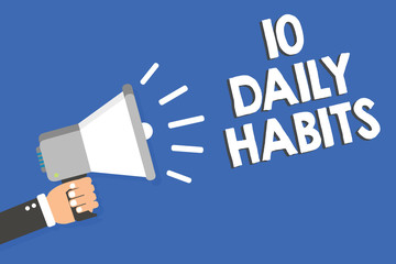 Text sign showing 10 Daily Habits. Conceptual photo Healthy routine lifestyle Good nutrition Exercises Man holding megaphone loudspeaker blue background message speaking loud