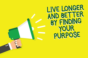 Writing note showing Live Longer And Better By Finding Your Purpose. Business photo showcasing Look for a goal set mission Man holding megaphone loudspeaker yelliw background speaking loud
