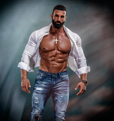 Muscular Male Model Wearing Unbuttoned White Shirt Exposing His Muscular Torso