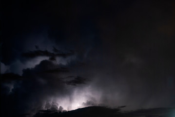 Night clouds thunderstorm, light power in the sky, latin america, long exposure.