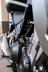 Close-up of the engine and exhaust of a beautiful motorcycle