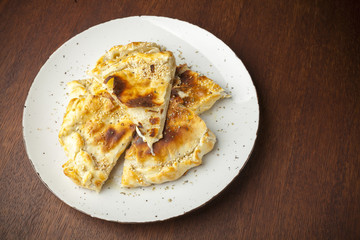 pizza dough with garlic and cheese