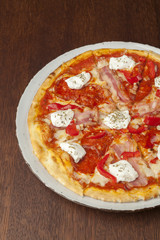 pizza with hot sausage and bacon